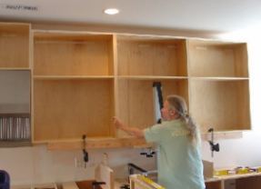 Lifting the cabinets...
